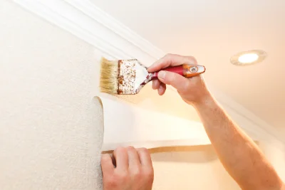Pose de papier peint à Magland — revêtements muraux et toiles de verre
